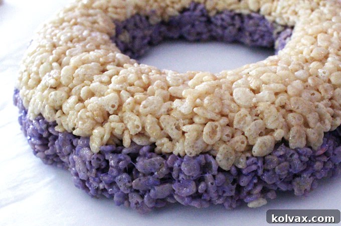 Turn the cake out the pan to check the layers as you go - A helpful tip for assembling your Ombre Rice Krispie Cake: gently unmold the cake during the layering process to check the color progression and ensure the ombre effect is perfect before adding the final layers.