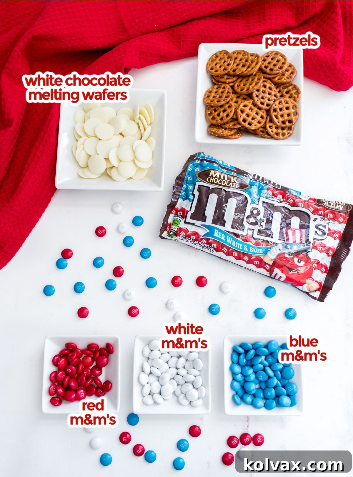 All the ingredients you will need to make Patriotic Flower Pretzel Bites including pretzels, white chocolate melting wafers and Red White and Blue M&M's.