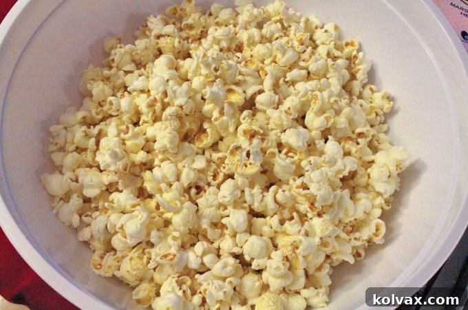 Freshly popped popcorn ready for caramel coating