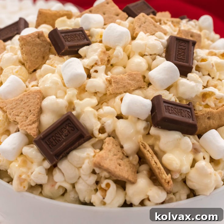Campfire Crunch Popcorn 11 S'mores Popcorn - A delicious and easy sweet and salty treat perfect for movie nights.