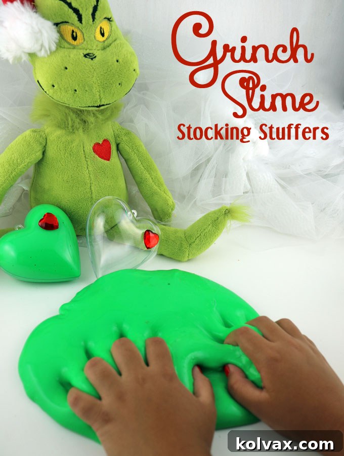 Our Grinch Slime - fun and colorful homemade GAK that would be great as a Christmas Stocking Stuffer or a Holiday Party Favor. We have step by step directions on how to make this easy to make DIY Christmas Craft. The kids will love playing with this ooey, gooey Holiday sensory activity. Follow us for more fun Christmas DIY Gifts.