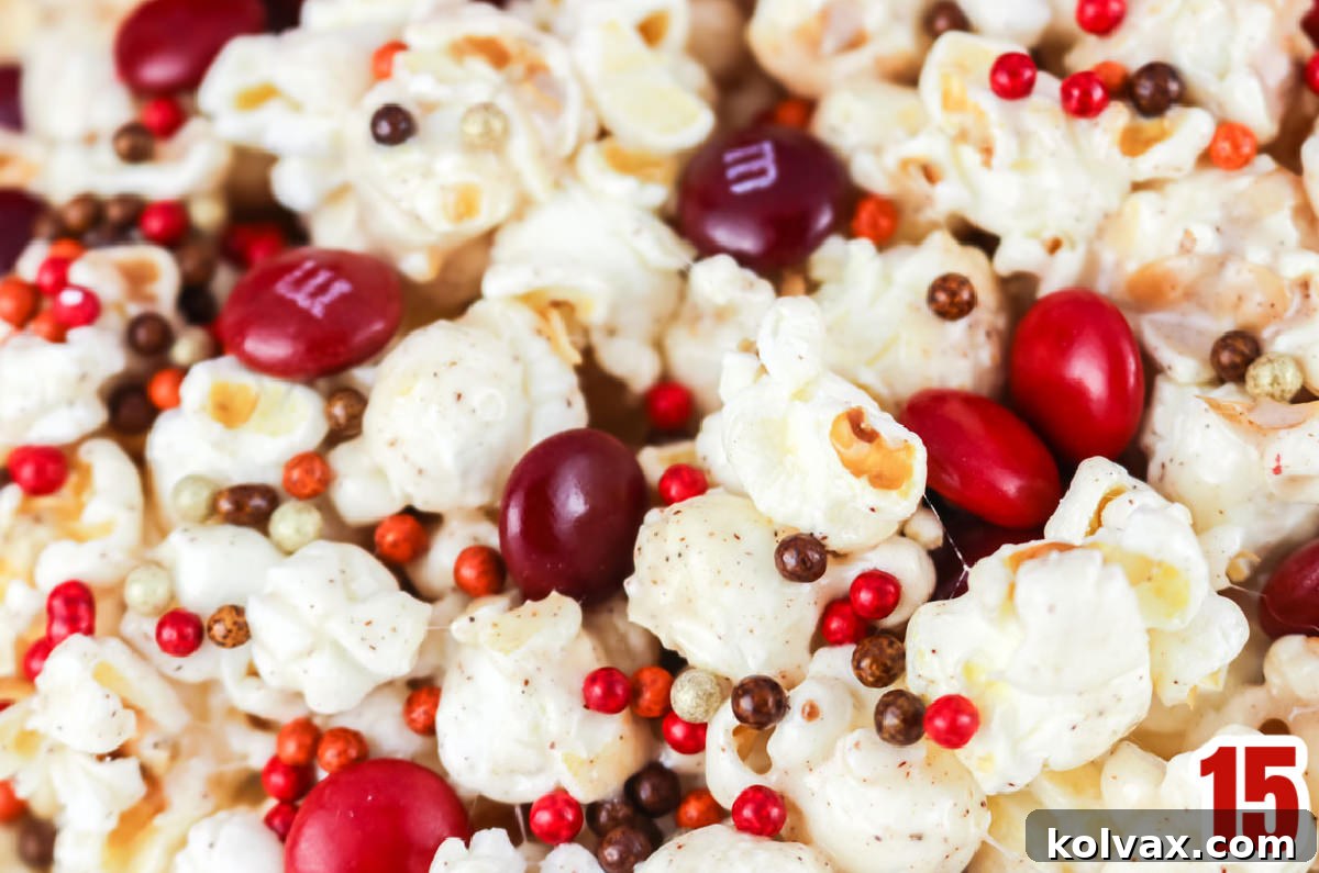Closeup on a freshly made batch of Pumpkin Spice Popcorn, beautifully coated and ready to serve.