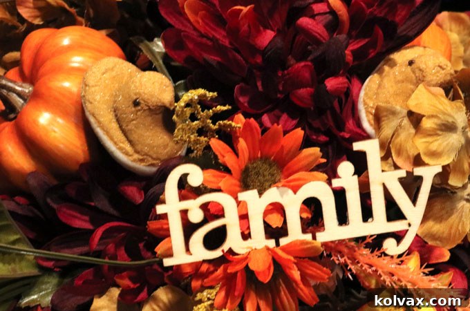 Thanksgiving Candy Centerpiece with artificial flowers added, showcasing the complete candy arrangement