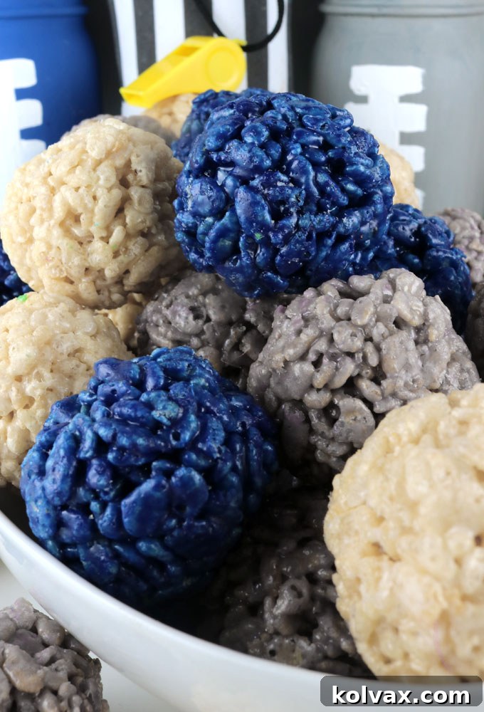 A large pile of Dallas Cowboys Rice Krispie Bites ready for a party