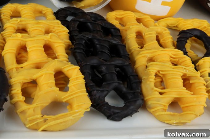 Assortment of finished Pittsburgh Steelers pretzels, black and yellow, beautifully arranged