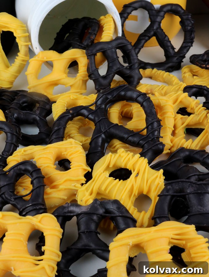 A vibrant close-up of finished black and gold Pittsburgh Steelers pretzels, ready to be enjoyed