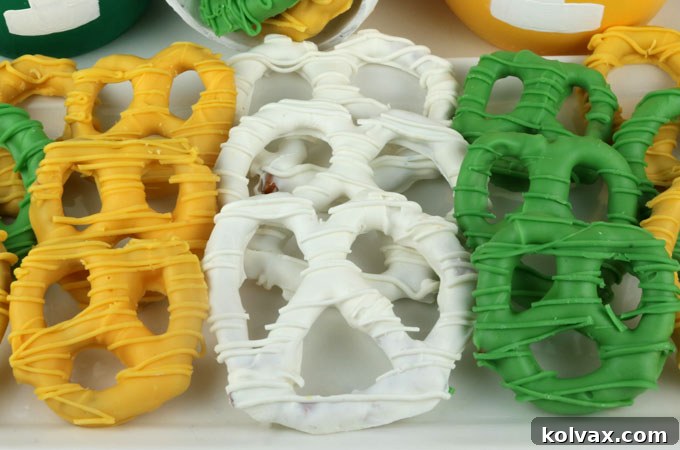 A beautiful display of Green Bay Packers pretzels, artfully arranged, highlighting the team's iconic gold, green, and white colors.