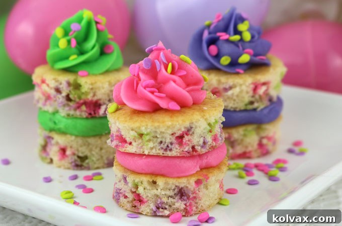Vibrant Springtime Confetti Cake Bites with colorful frosting and sprinkles, ready for a festive occasion.