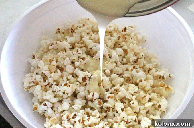 Pouring Marshmallow Mixture Over Popcorn