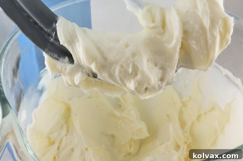 Essential tools for perfect cupcake frosting swirls: piping bag, decorating tips, and delicious buttercream