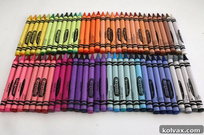 Assorted Crayola Crayons in a box, ready for crafting a teacher appreciation gift