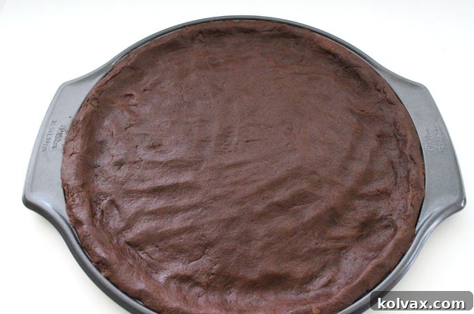 Cookie dough ready for baking, with a raised edge