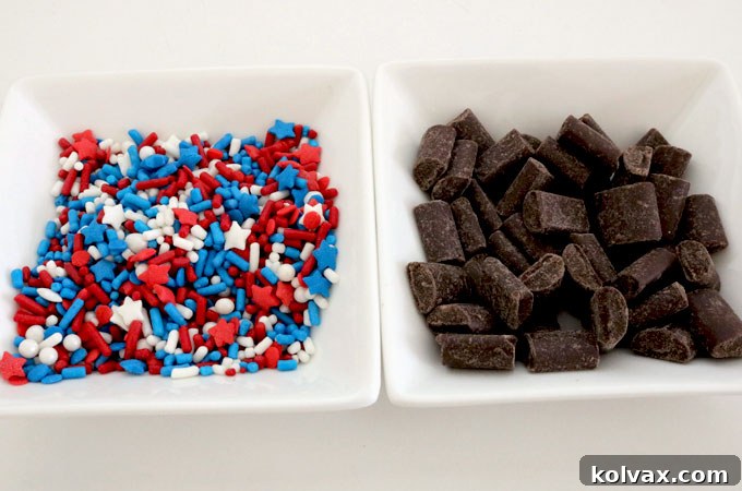 Assorted red, white, and blue candy mix-ins for cookie pizza