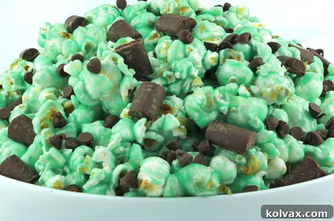 Close-up of ready-to-serve Chocolate Mint Popcorn, showcasing its irresistible texture and toppings.