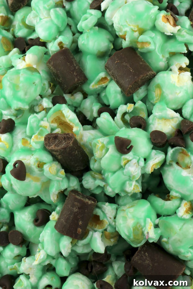 Chocolate chips and chunks sprinkled over the warm mint marshmallow popcorn.