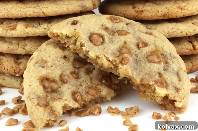 Irresistibly chewy, buttery Toffee Chip Cookies bursting with caramel Heath English Toffee Bits – your search for the perfect homemade toffee cookie ends here. This easy-to-make recipe yields melt-in-your-mouth caramel cookies perfect for any occasion.