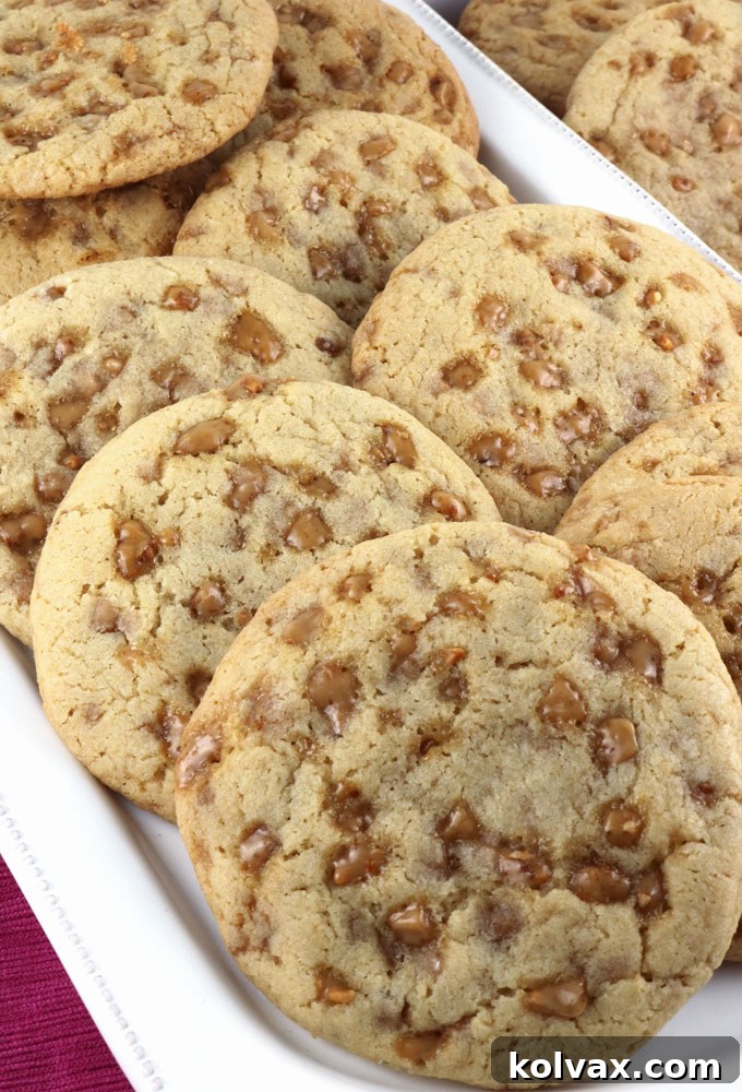 A stack of perfectly baked homemade Toffee Chip Cookies, ready to be enjoyed.