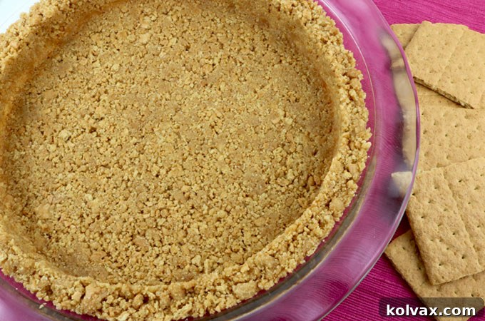 Learn how to make the best homemade Graham Cracker Crust, perfect for pies and cheesecakes, with a simple and delicious recipe that tastes far superior to store-bought versions.