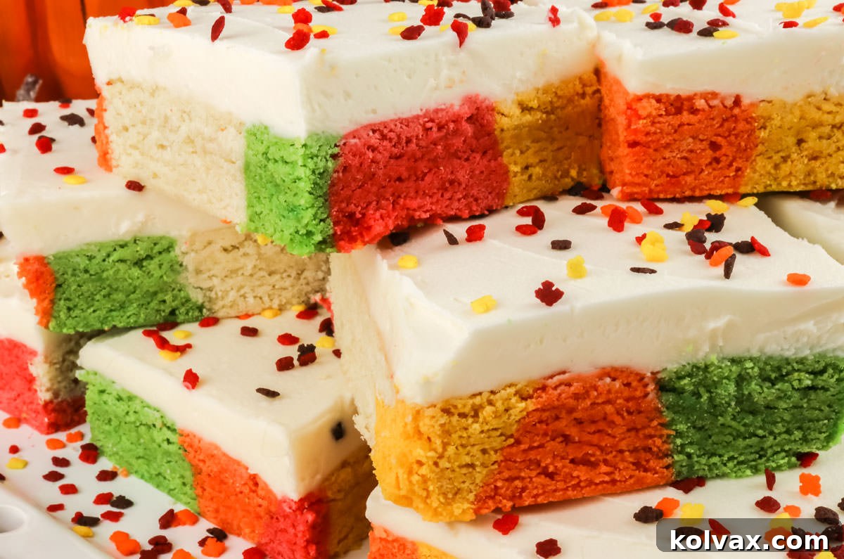 Marbled Harvest Sugar Cookie Bars 2 A close-up of a plate filled with beautifully marbled Harvest Sugar Cookie Bars, adorned with festive fall sprinkles, ready to be enjoyed as a seasonal dessert.