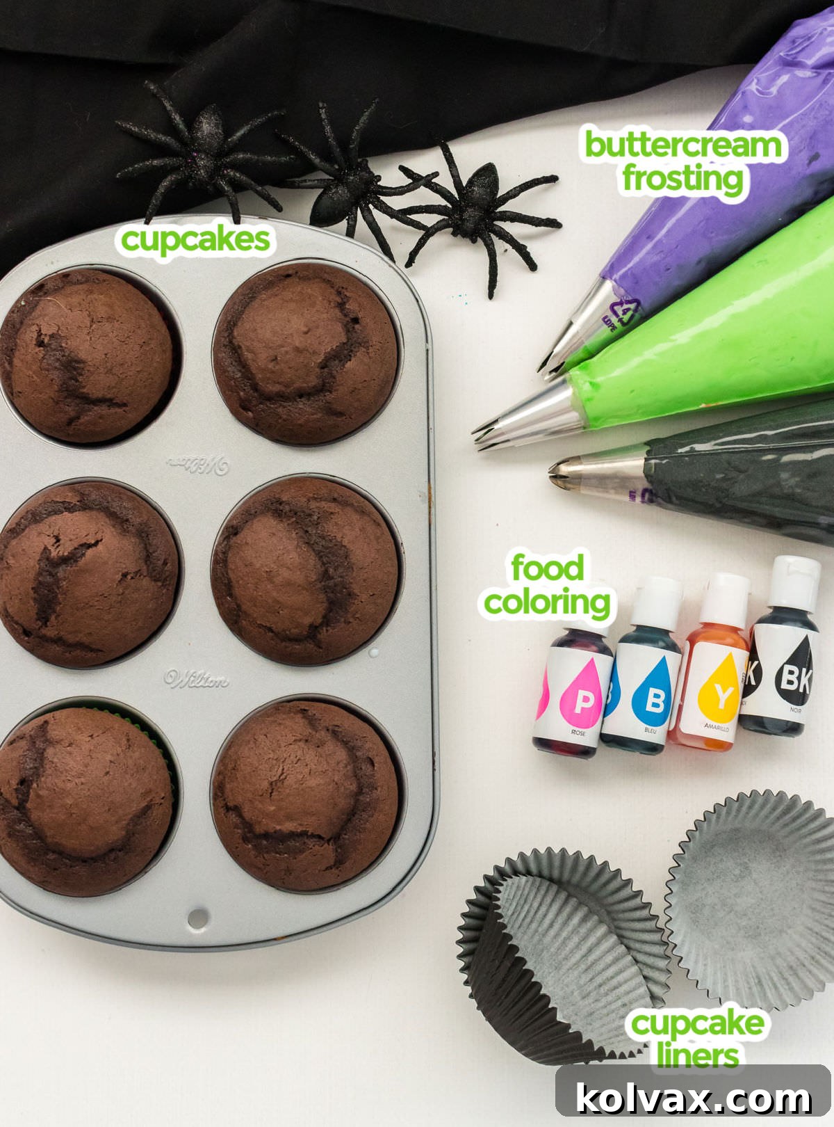 All the ingredients you will need to make Bewitched Halloween Cupcakes including cupcakes, buttercream frosting, food coloring and cupcake liners.