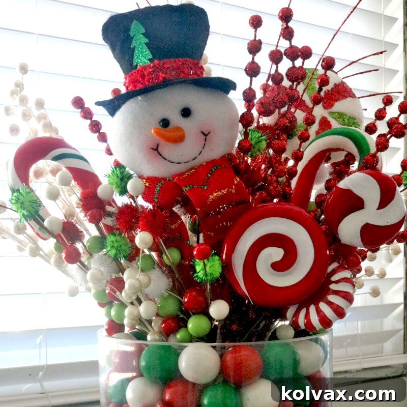 The fully assembled Christmas Candy Centerpiece, adorned with holiday decorations and candy canes, ready to brighten any festive table.