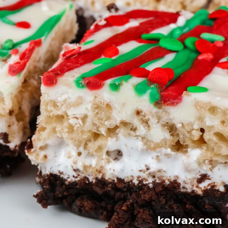 Beautifully presented Christmas Brownie Rice Krispie Treats, layered and festive, ready to be enjoyed. A perfect holiday dessert.