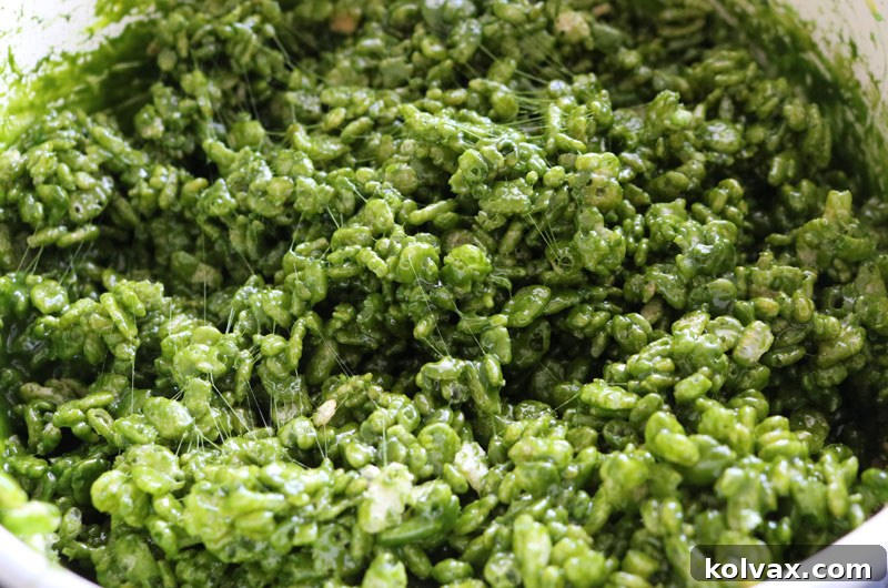Green Rice Krispie Treats mixture ready for shaping.