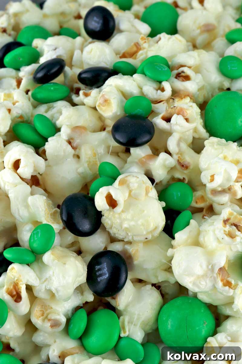 Vertical shot of Philadelphia Eagles Popcorn, highlighting the green and black M&M's.