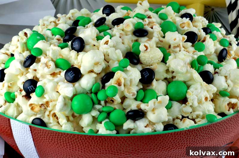 Serving Philadelphia Eagles Popcorn, a delicious, easy-to-make game day treat for fans.