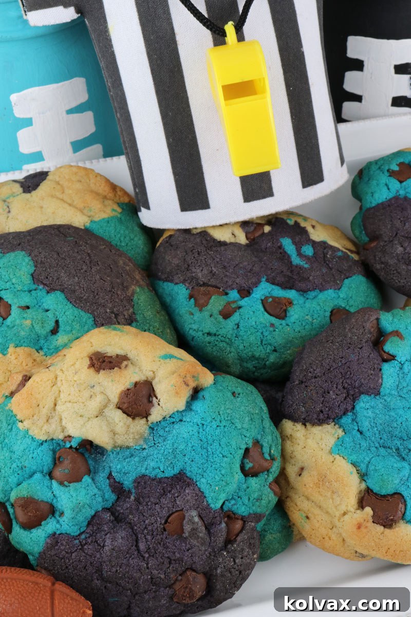 A stack of delicious Jacksonville Jaguars Chocolate Chip Cookies, showing their beautiful blue, black, and white marble design, ready to be enjoyed by fans. Perfect for any football season gathering.