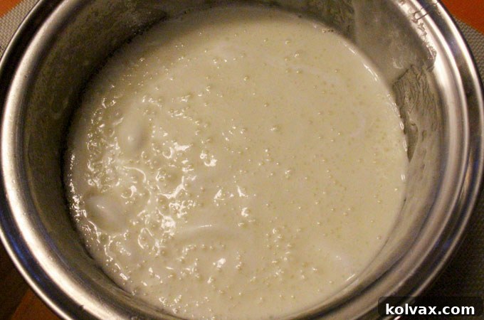 Melted butter and mini marshmallows in a saucepan