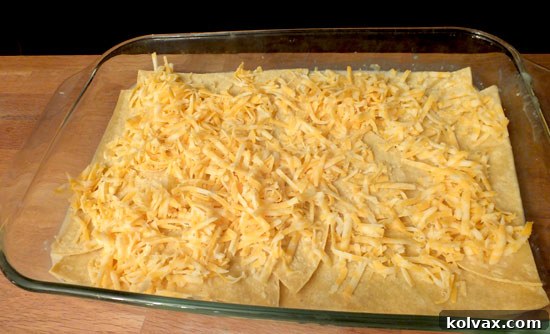 Third Layer of Chicken Tortilla Casserole with Shredded Cheese
