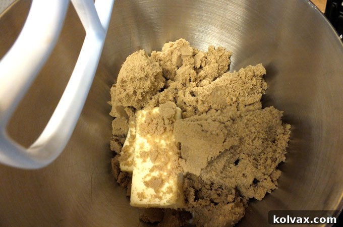 Creaming butter and brown sugar for chewy cookies