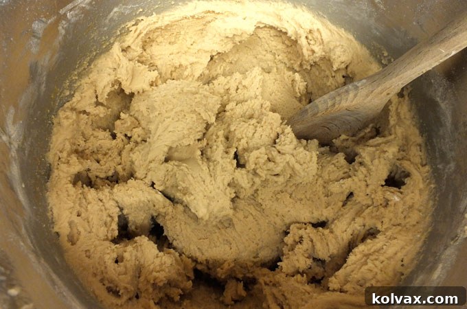 Incorporating dry ingredients into Spring M&M cookie dough