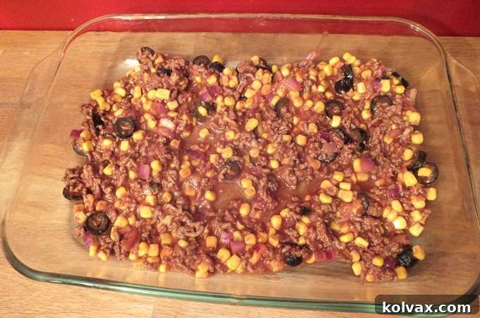 First layer of meat mixture in Enchilada Casserole