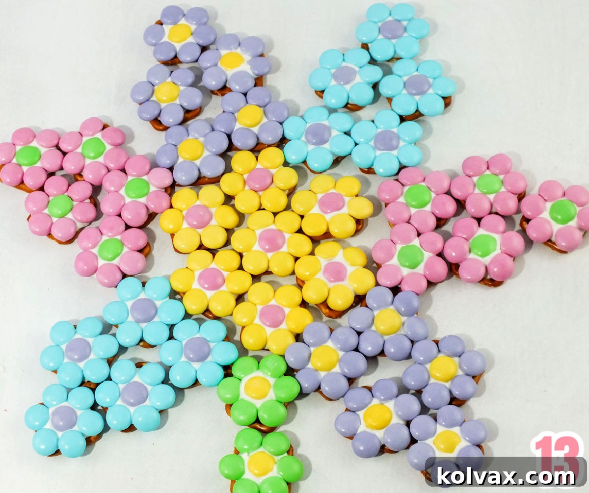 Closeup on Spring Flower Pretzel Bites artfully arranged in the shape of a large flower on a white background.
