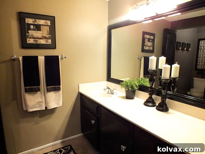 DIY Bathroom Mirror Makeover - How to frame a plain mirror for under $100