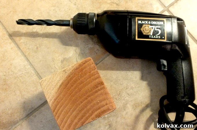 Drill holes for pens and pencils in the top of the wood block