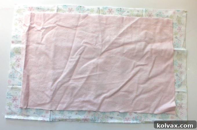 Cutting the second, larger piece of fabric for the bottom of the travel tray cushion, allowing for seams.