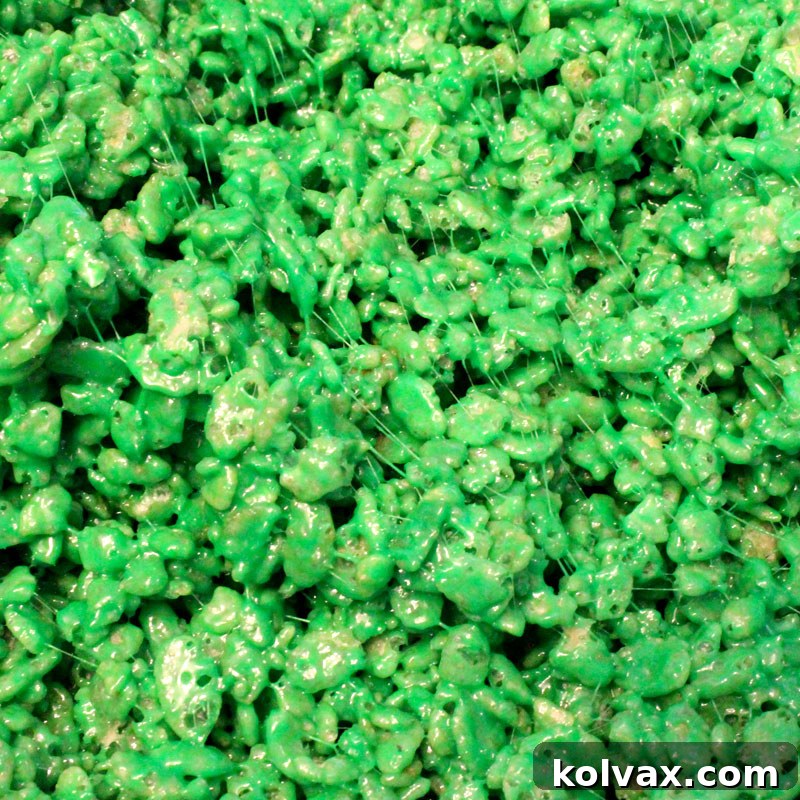 Vibrant bright green colored Rice Krispie Treats, perfect for St. Patrick's Day or spring.