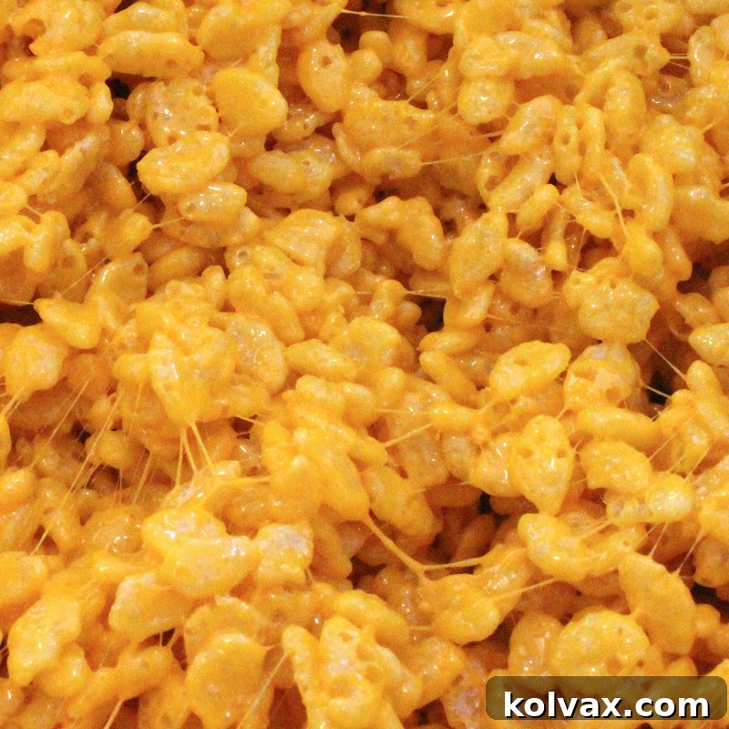 Shimmering gold colored Rice Krispie Treats, adding a touch of elegance.