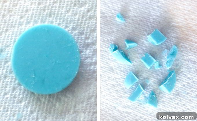 Chopping up the Blue Candy Melt - Preparing the blue candy melt for snowflake designs. Carefully cut the candy melt into approximately 12 tiny, irregular pieces for a free-form snowflake pattern on your pretzel bites.