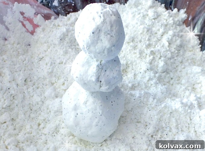 Disney Frozen DIY Play Snow: Create a magical 'Do You Want to Build a Snowman' activity for your Frozen Birthday Party. Easy to make, feels just like real snow! Get full directions and more fun Frozen party ideas here.