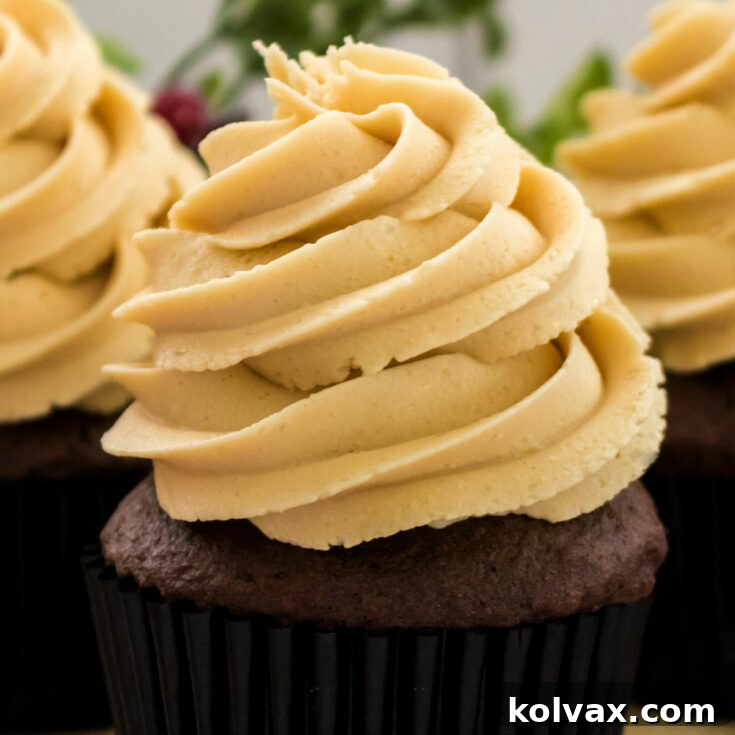 The Best Gingerbread Buttercream Frosting on a cupcake.