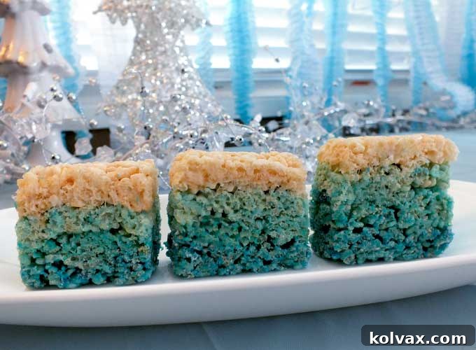 Create beautiful Ombre Rice Krispie Treats for your next Disney Frozen birthday party or any special occasion. These delightful layered treats are a surefire hit and can be customized with any color combination!