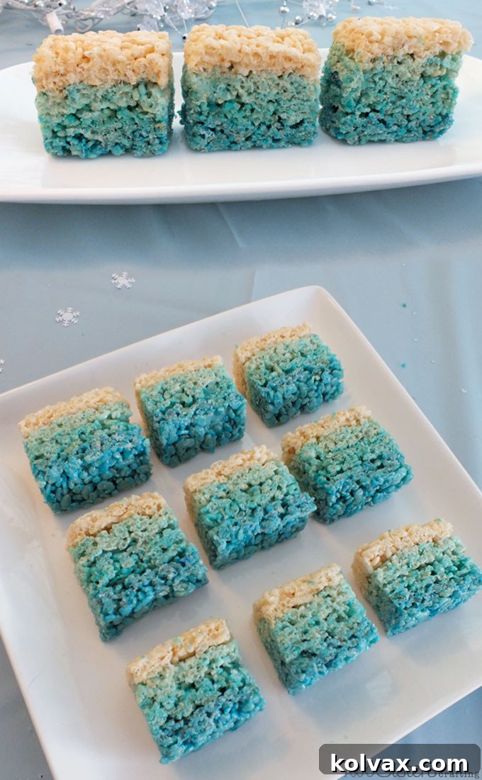 Disney Frozen Ombre Rice Krispie Treats - we made these beautiful Ombre Rice Krispie Treats for our Disney Frozen Birthday Party. They were a big hit and would be pretty in any color combination or for any special occasion or party. For more great Frozen Party Ideas, follow us on Pinterest.