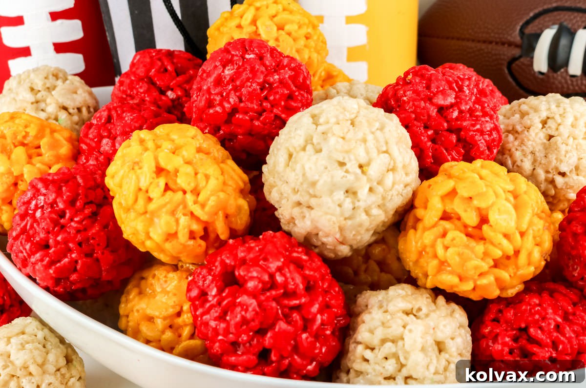 Chiefs Kingdom Krispies 2 Closeup on a serving bowl filled with Red, Gold and White Kansas City Chiefs Rice Krispie Bites.