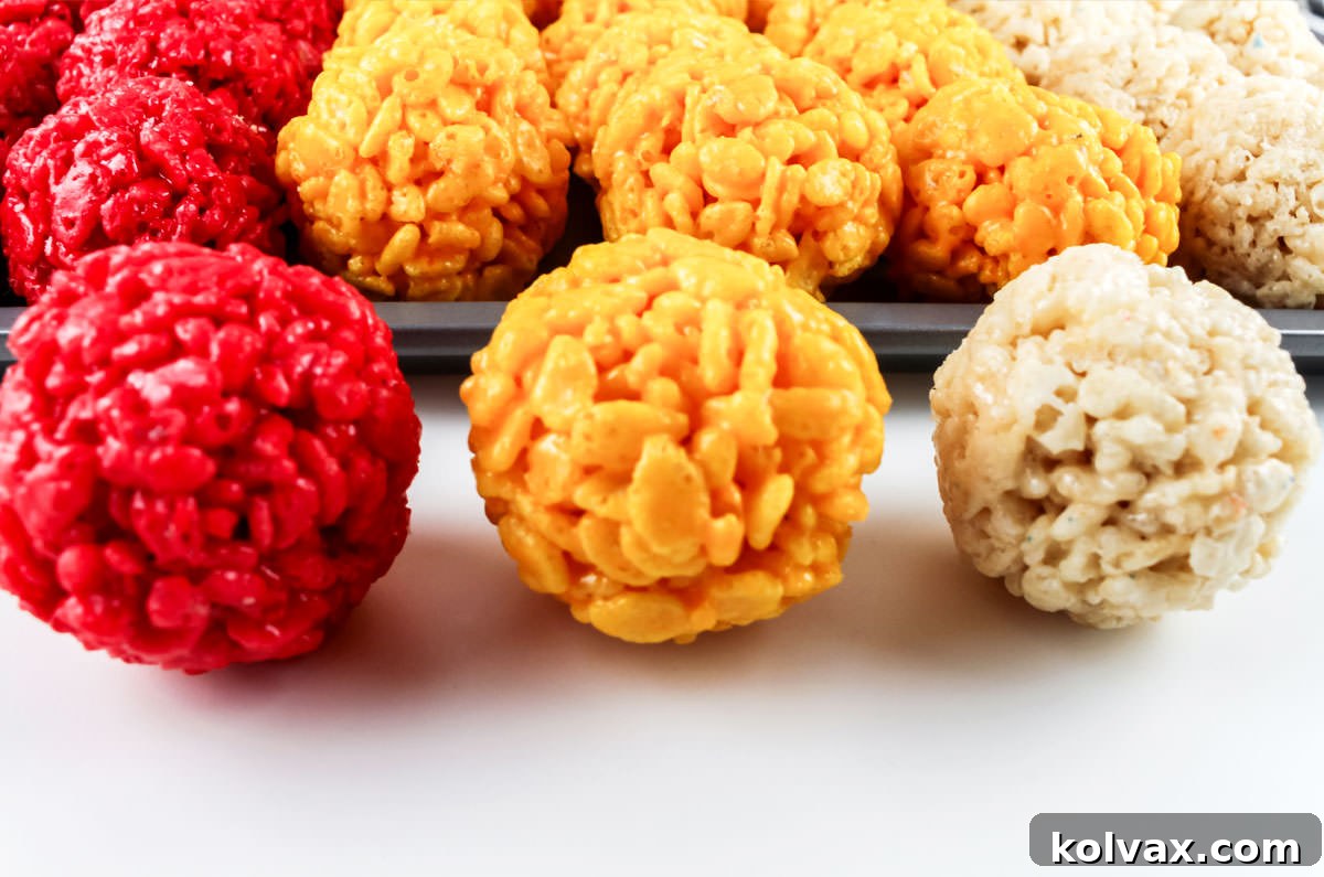 Chiefs Kingdom Krispies 3 Closeup on three colors of Krispie Bites in Red, Gold and White.