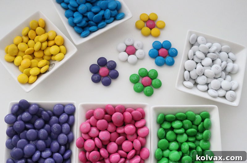 Assorted M&M candies in a variety of vibrant colors, ready for cookie decoration.
