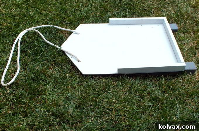 Attaching the white nylon rope to the front of the DIY sled